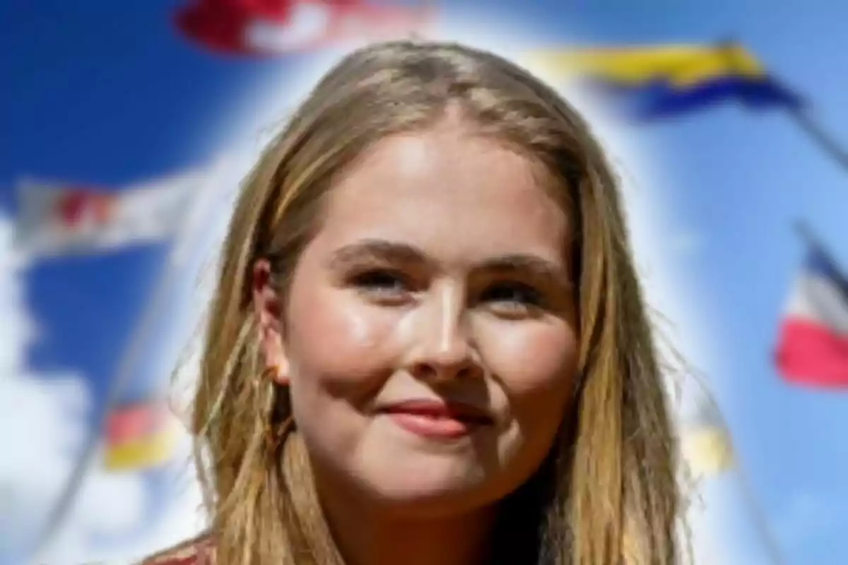 Close-up photo montage of a smiling Amalia of the Netherlands with several blurred flags in the background and a blue sky.