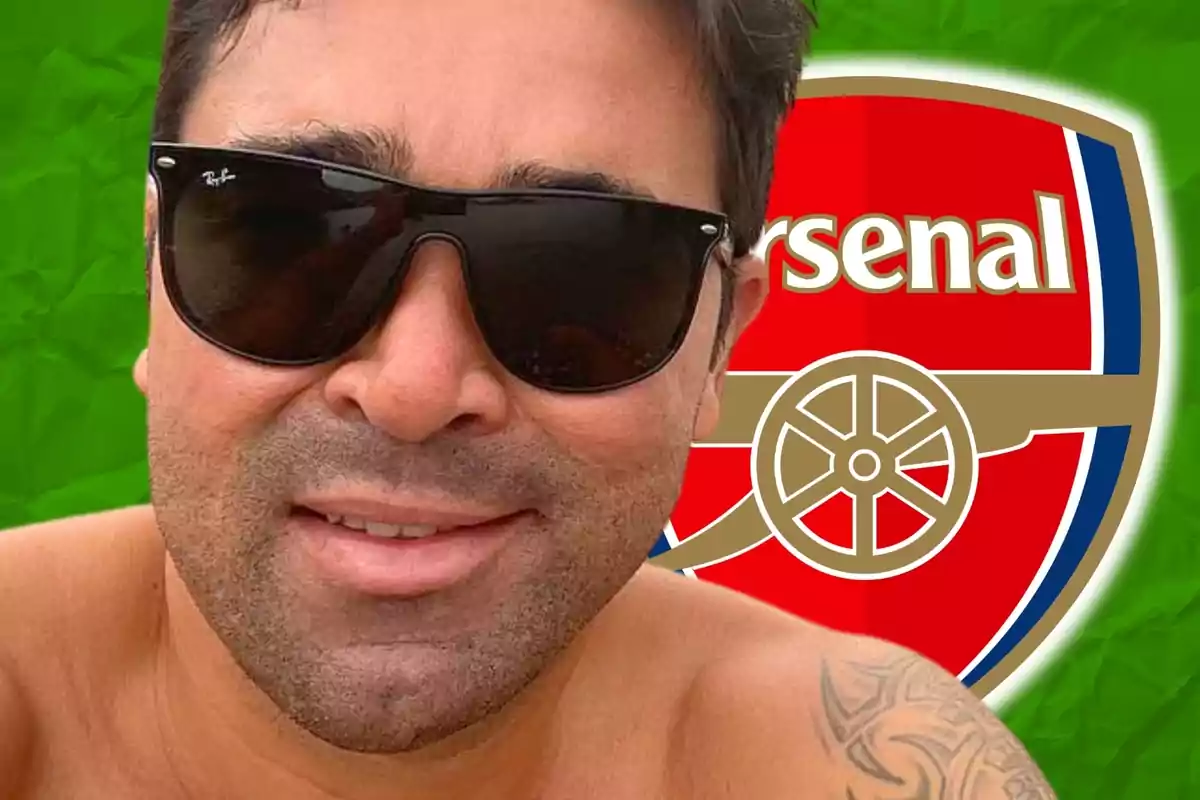 Man with sunglasses and a tattoo on his shoulder in front of the Arsenal crest against a green background
