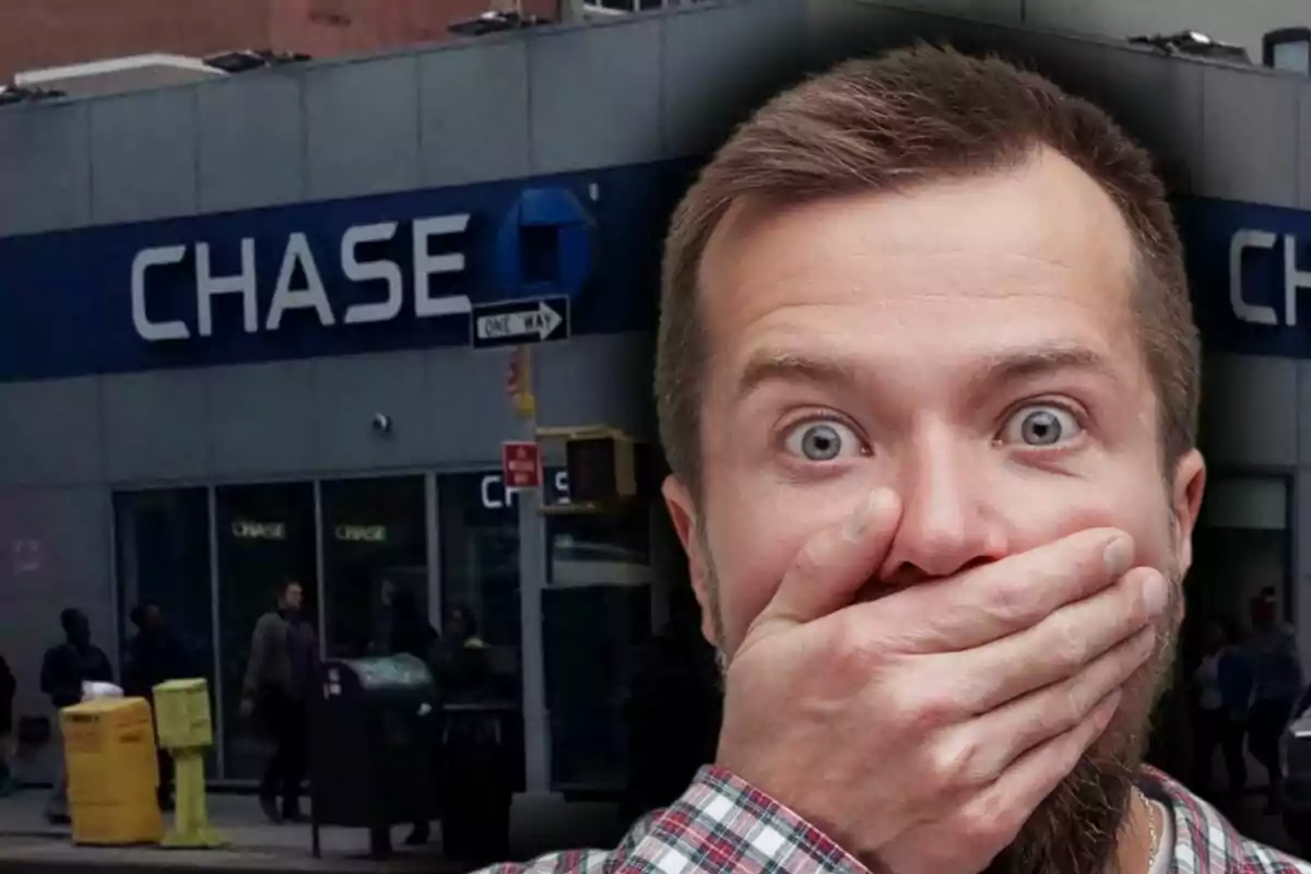 Surprised man covering his mouth in front of a Chase bank branch. Surprised man covering his mouth in front of a Chase bank branch.