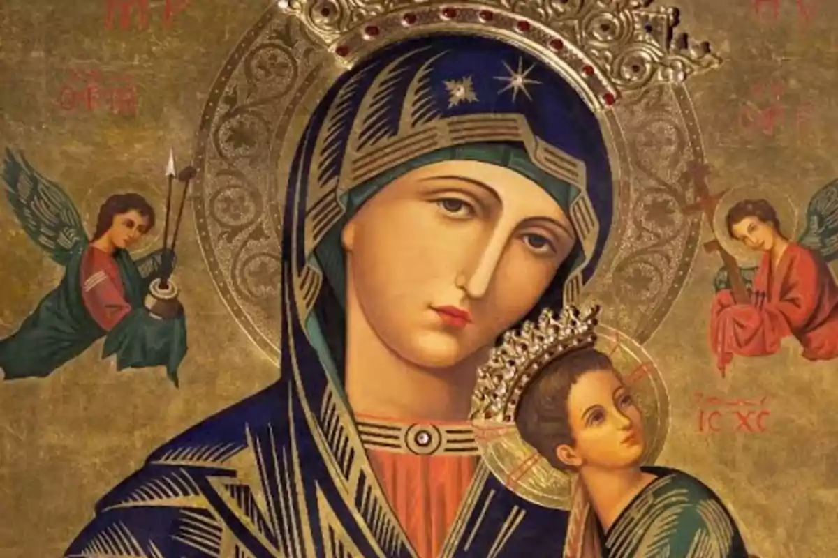 Icona religiosa amb la imatge de la Mare de Déu i el Nen Jesús envoltats d’àngels sobre un fons daurat Icona religiosa amb la imatge de la Mare de Déu i el Nen Jesús envoltats d’àngels sobre un fons daurat