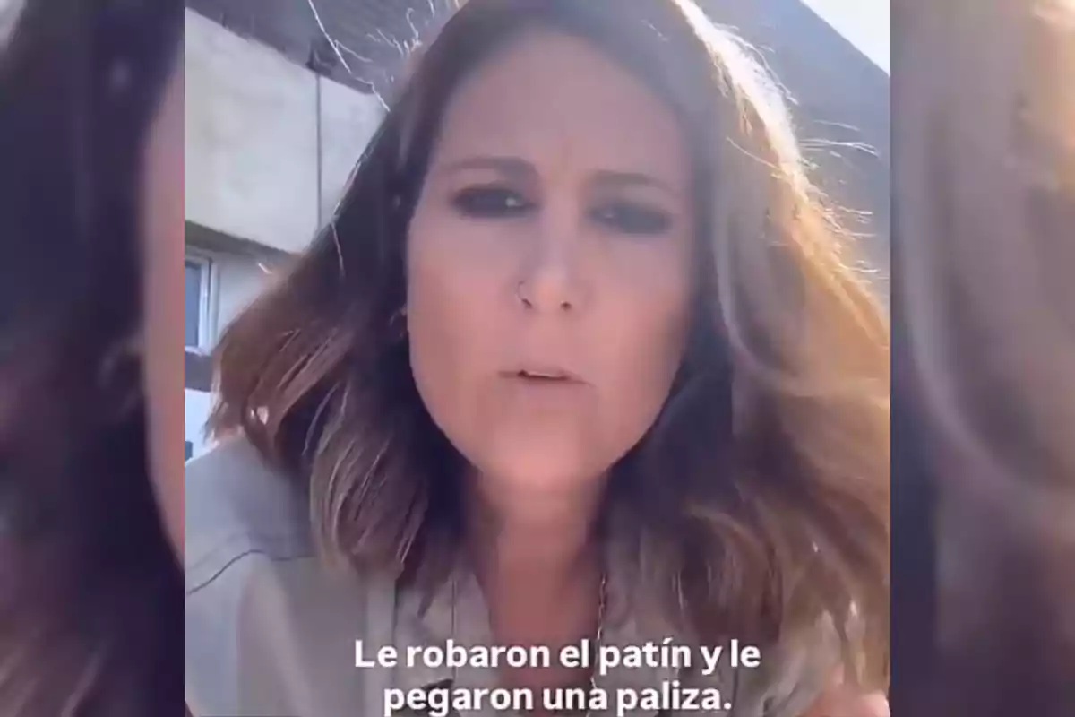 Light brown-haired woman looking at the camera with a serious expression and text at the bottom that says They stole her scooter and beat her up