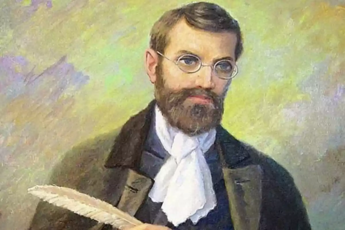 Retrato pintado de un hombre con barba y gafas que sostiene una pluma y viste ropa elegante del siglo XIX Retrato pintado de un hombre con barba y gafas que sostiene una pluma y viste ropa elegante del siglo XIX