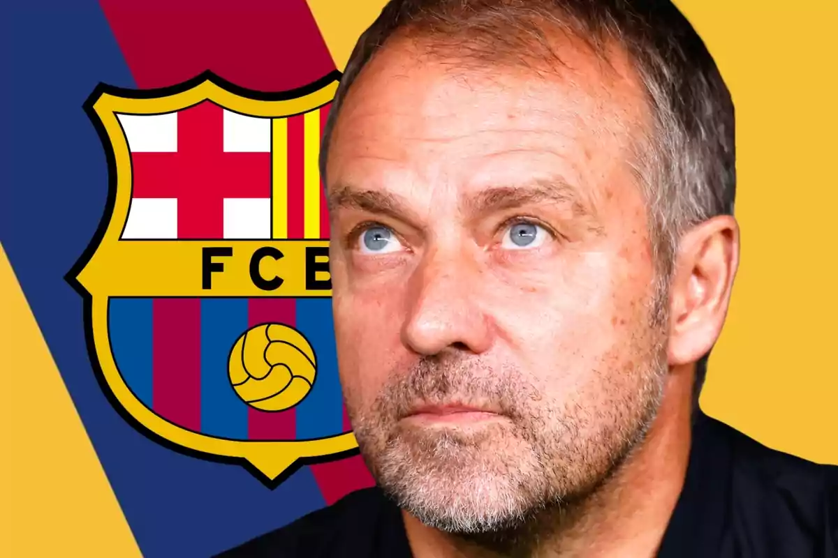 Short-haired, bearded man looking up with the FC Barcelona crest in the background