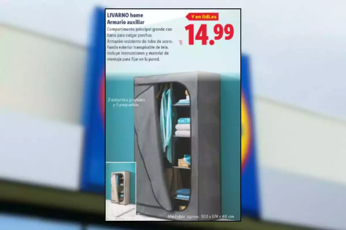 Armario auxiliar de tela color gris con varios estantes y barra para colgar ropa, promocionado por Lidl a un precio de 14,99 euros Armario auxiliar de tela color gris con varios estantes y barra para colgar ropa, promocionado por Lidl a un precio de 14,99 euros