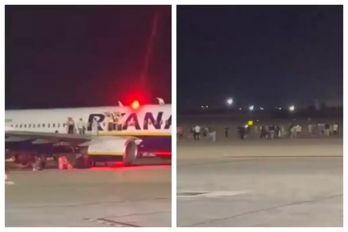 Un avió de Ryanair aturat a la pista durant la nit amb passatgers i tripulació fora de l’aeronau i grups de persones reunides a la llunyania a l’aeroport.