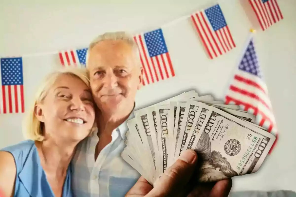 Smiling elderly couple with hundred-dollar bills in the foreground and U.S. flags in the background