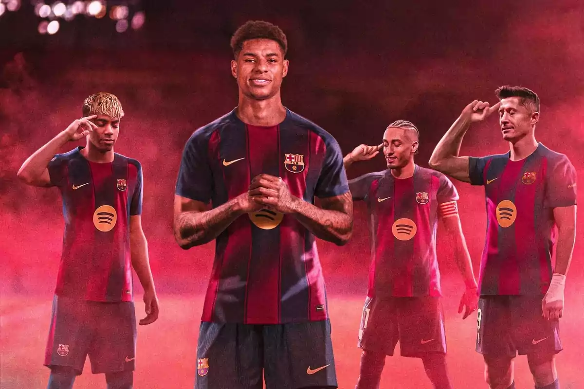 Four players in FC Barcelona uniforms pose against a reddish background with smoke. Four players in FC Barcelona uniforms pose against a reddish background with smoke.