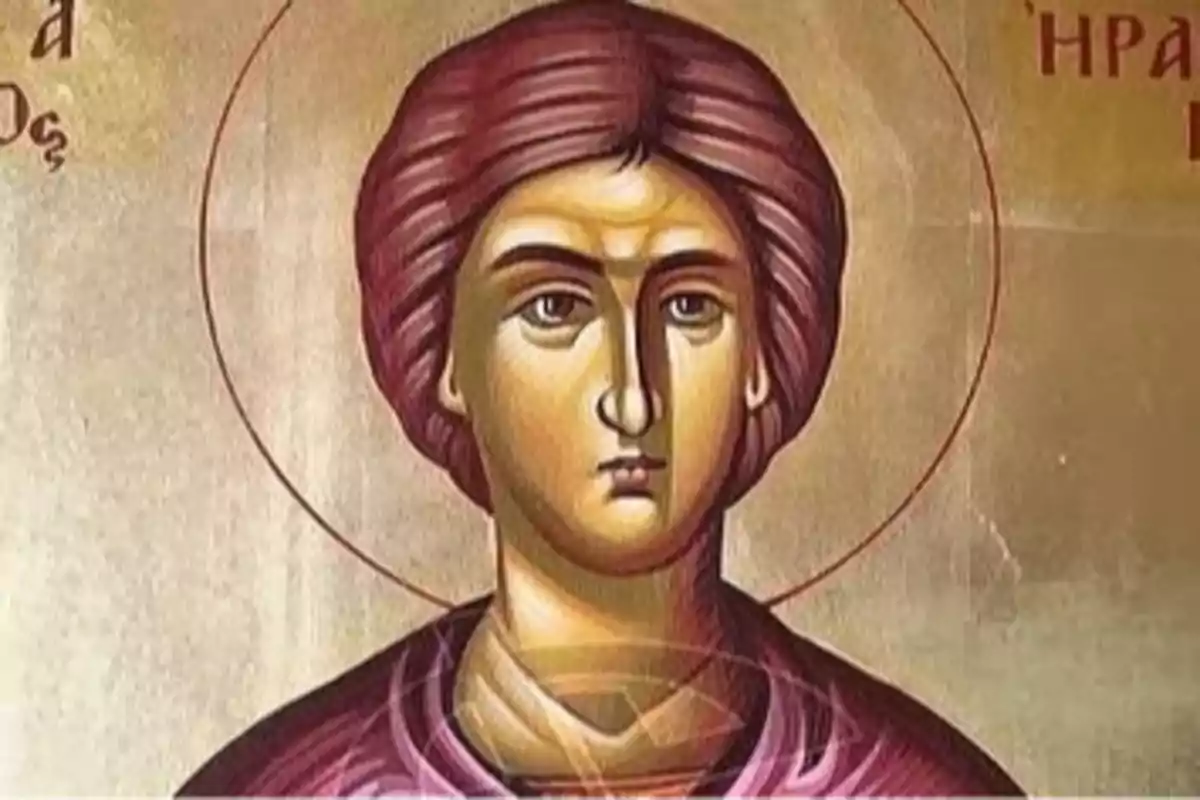 Pintura religiosa d’estil bizantí que mostra el rostre d’una figura amb aurèola i cabell castany fosc pentinat cap enrere Pintura religiosa d’estil bizantí que mostra el rostre d’una figura amb aurèola i cabell castany fosc pentinat cap enrere