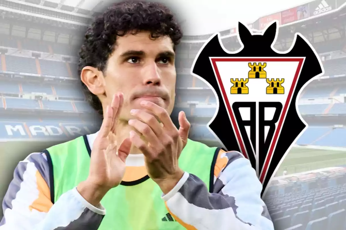 Soccer player applauding with the Albacete Balompié crest and a stadium in the background