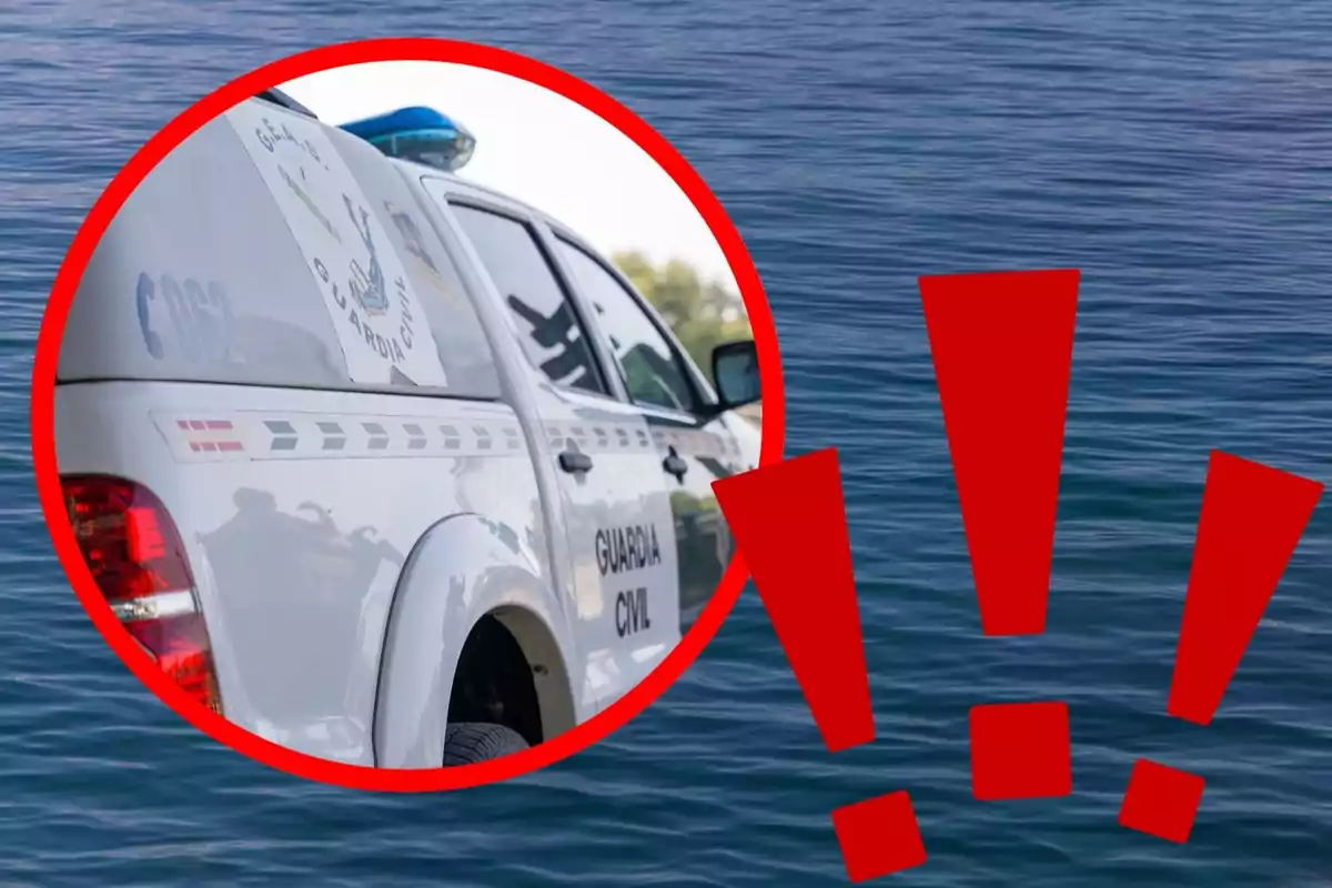 Vehículo de la Guardia Civil resaltado con un círculo rojo sobre un fondo de agua y signos de exclamación en color rojo