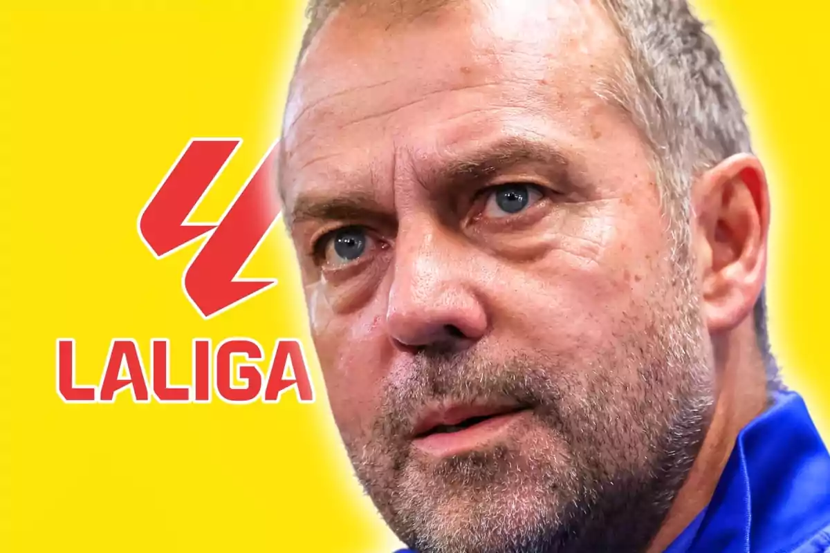 Short-haired, bearded man with a serious expression in front of a yellow background featuring the LaLiga logo and text.
