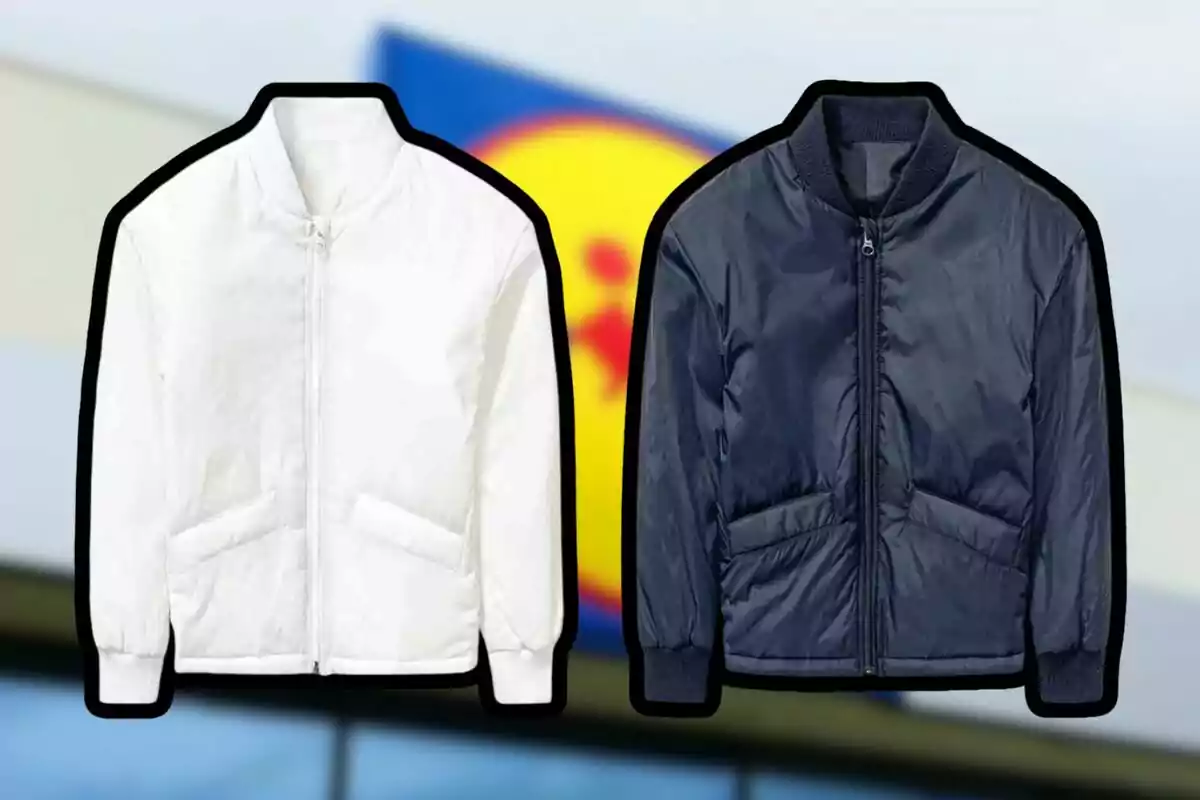 Two bomber jackets in white and navy blue with a blurred store sign in the background. Two bomber jackets in white and navy blue with a blurred store sign in the background.