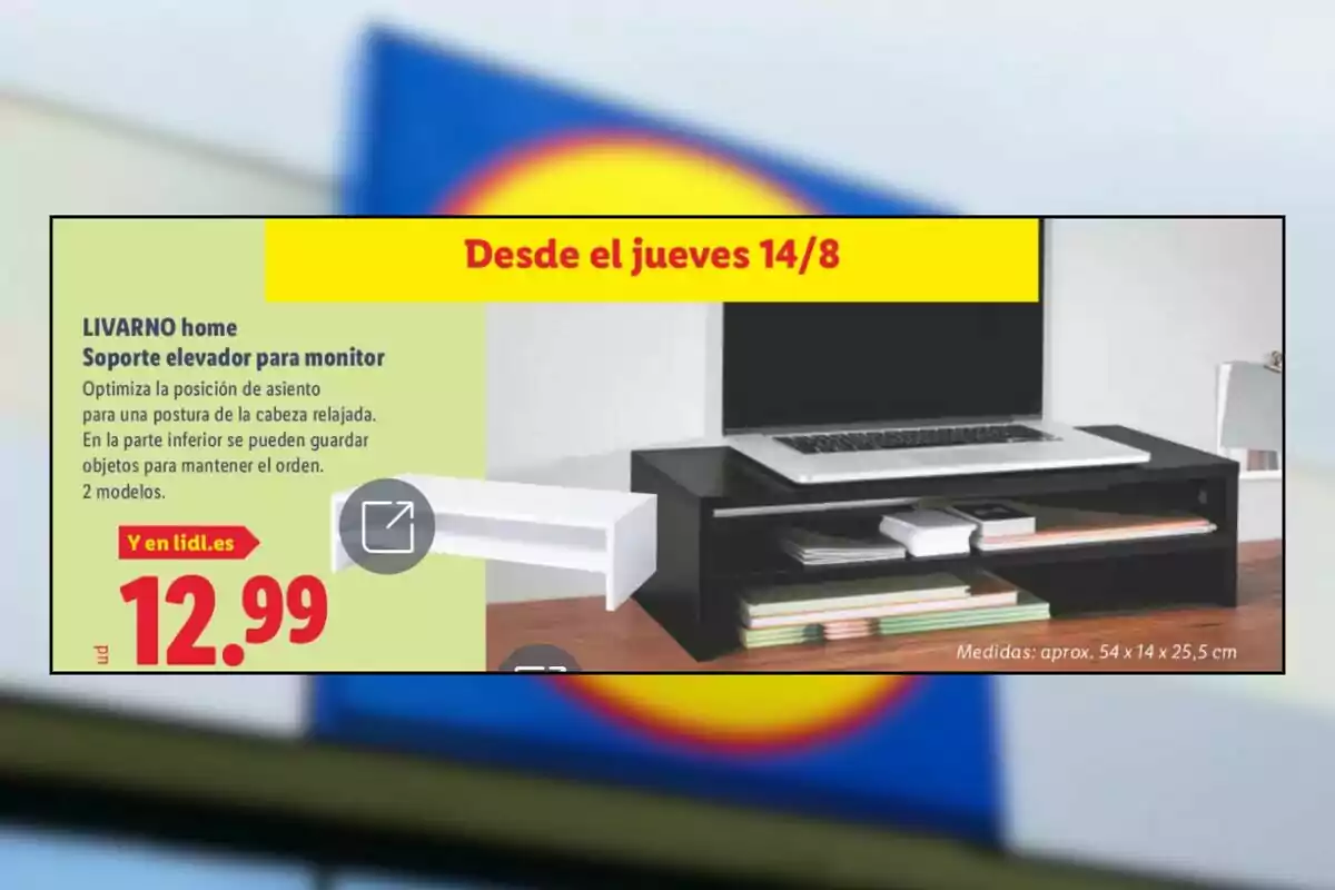 Publicitat d’un suport elevador per a monitor de la marca LIVARNO home disponible a Lidl a partir de dijous 14 d’agost per 12,99 euros, mostrant el producte de color negre amb un portàtil a sobre i diversos objectes organitzats a sota. Publicitat d’un suport elevador per a monitor de la marca LIVARNO home disponible a Lidl a partir de dijous 14 d’agost per 12,99 euros, mostrant el producte de color negre amb un portàtil a sobre i diversos objectes organitzats a sota.