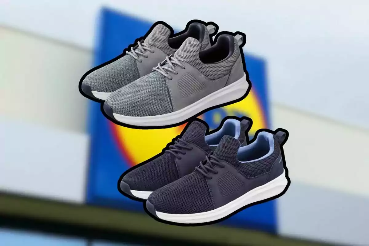 Dos pares de tenis deportivos en color gris y azul marino con fondo desenfocado de un letrero de tienda Dos pares de tenis deportivos en color gris y azul marino con fondo desenfocado de un letrero de tienda