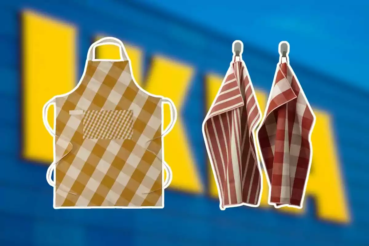 Brown and white checkered apron next to two red kitchen towels with different patterns on a blurred blue and yellow background Brown and white checkered apron next to two red kitchen towels with different patterns on a blurred blue and yellow background