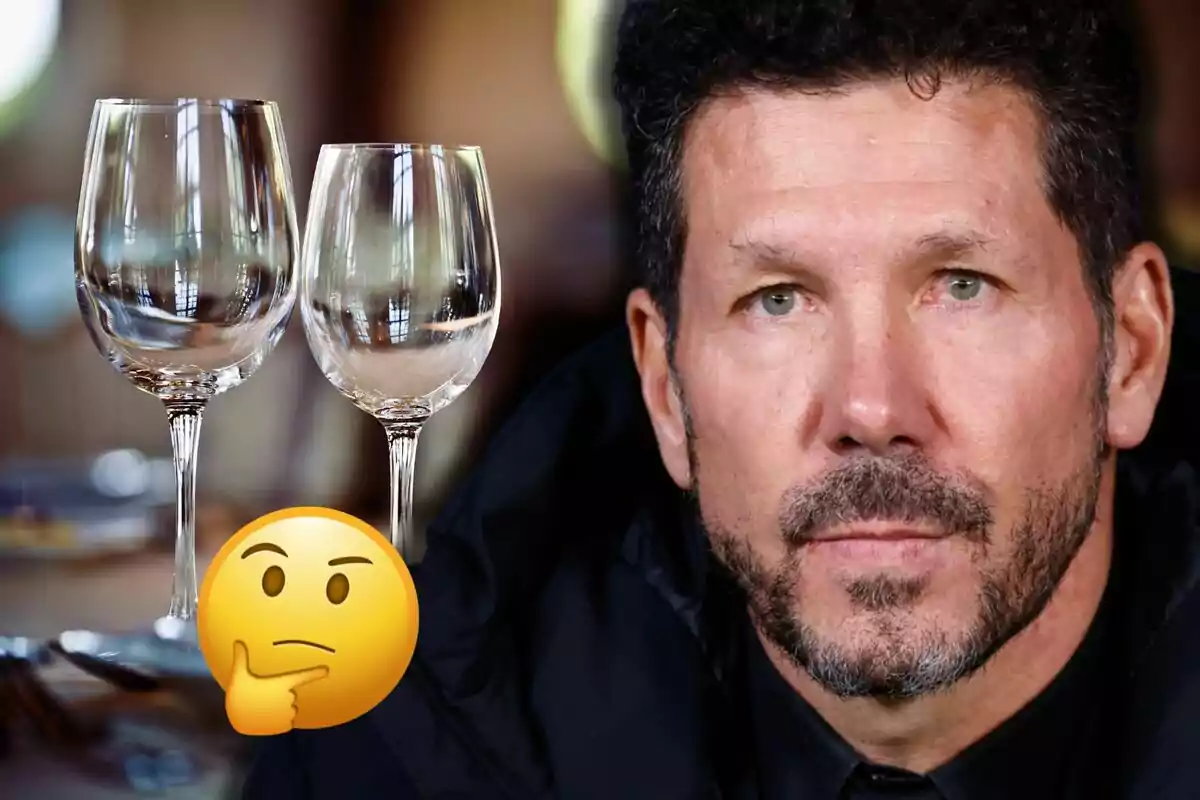 Simeone looking ahead with two glasses of wine and a thinking emoji
