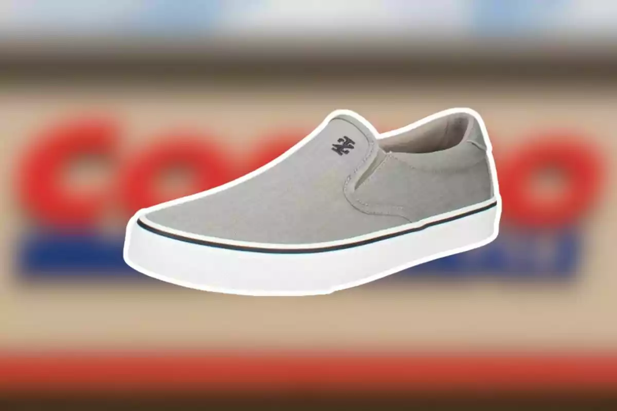 Gray slip-on sneaker with a white sole on a blurred background Gray slip-on sneaker with a white sole on a blurred background