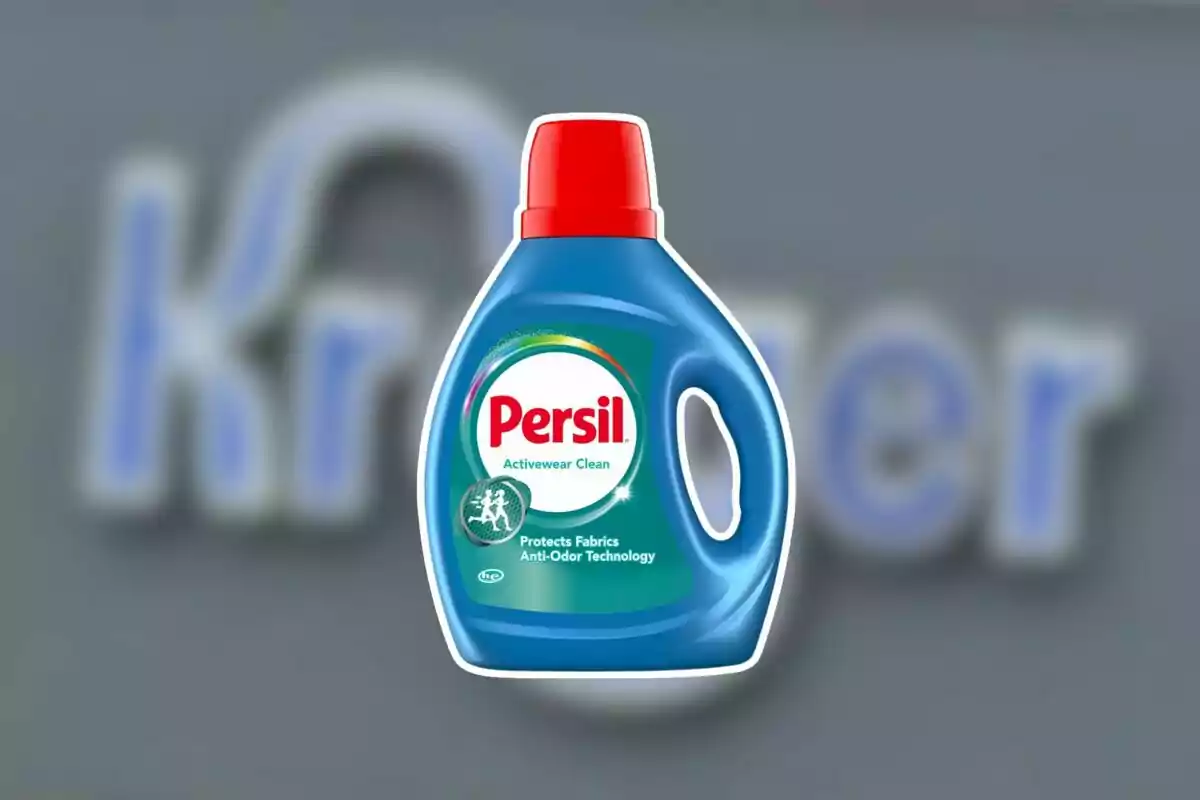 Persil Activewear Clean liquid detergent bottle with a red cap on a blurred background. Persil Activewear Clean liquid detergent bottle with a red cap on a blurred background.
