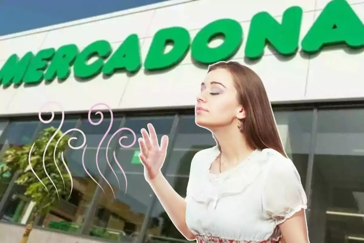 Dona gaudint d’una aroma agradable davant d’una botiga Mercadona