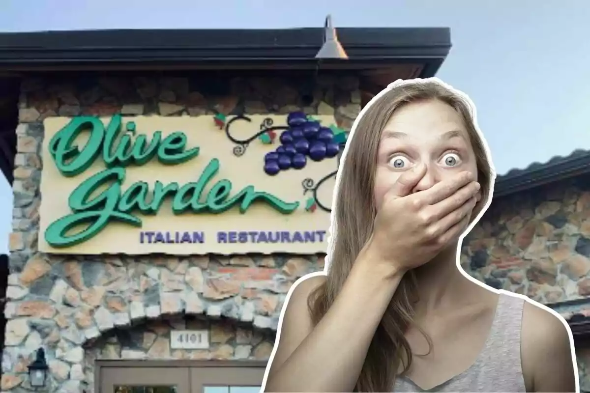 Una mujer con expresión de sorpresa se cubre la boca frente a la entrada de un restaurante Olive Garden