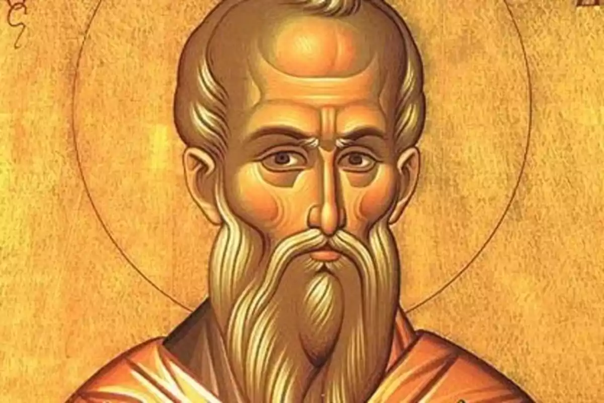 Icona religiosa d’un home amb barba llarga i túnica sobre fons daurat Icona religiosa d’un home amb barba llarga i túnica sobre fons daurat