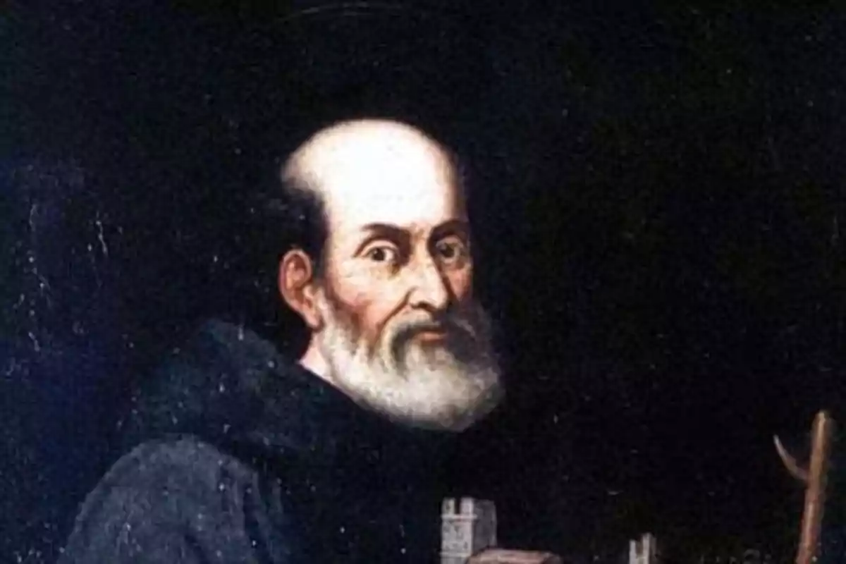 Retrat d’un home gran amb barba blanca i túnica fosca sobre un fons negre Retrat d’un home gran amb barba blanca i túnica fosca sobre un fons negre