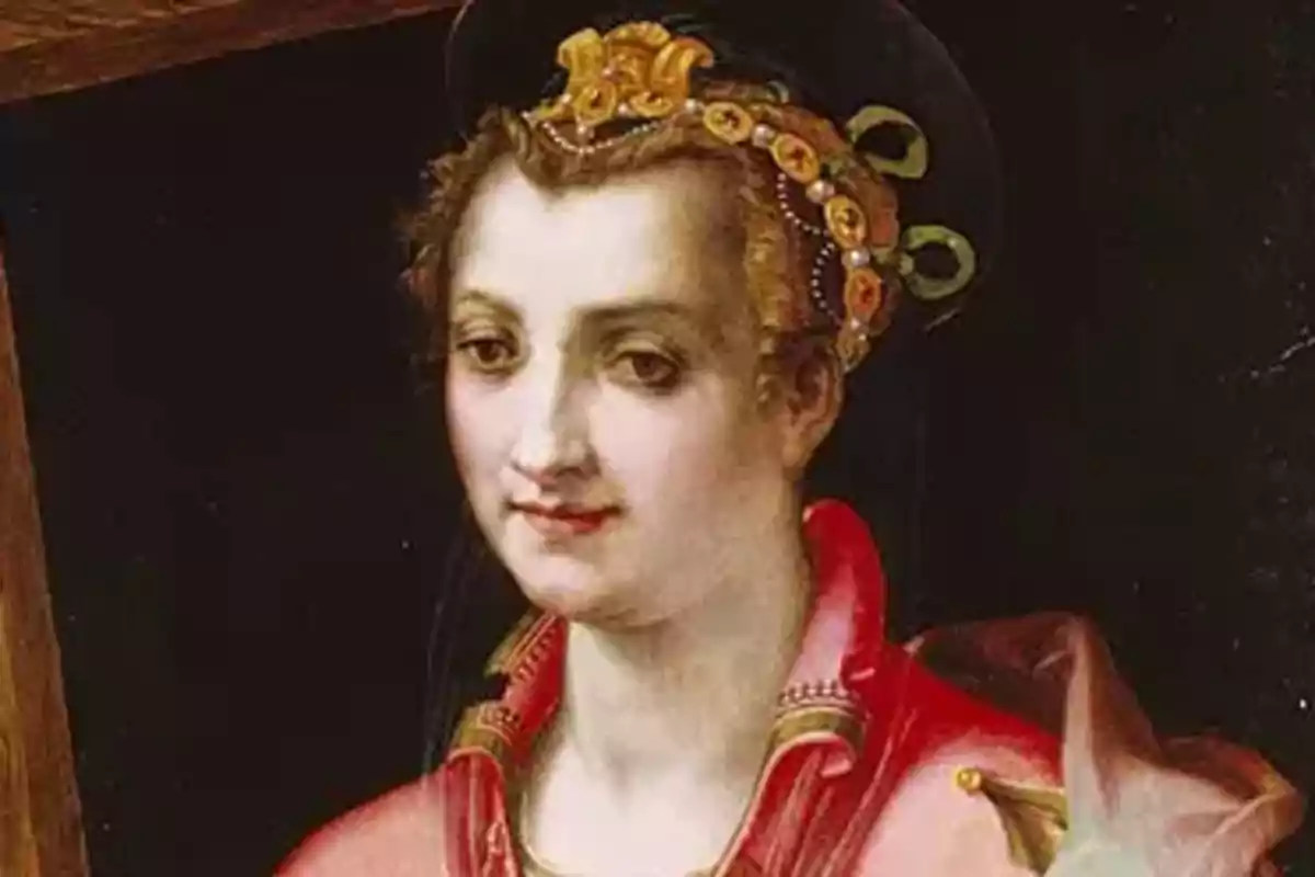 Retrat d’una dona renaixentista amb vestit vermell i tocat adornat amb perles i detalls daurats Retrat d’una dona renaixentista amb vestit vermell i tocat adornat amb perles i detalls daurats
