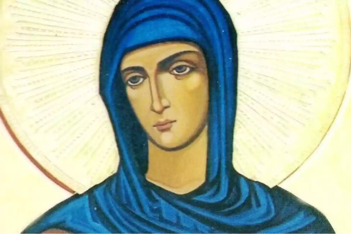 Pintura religiosa de una mujer con manto azul y halo dorado Pintura religiosa de una mujer con manto azul y halo dorado