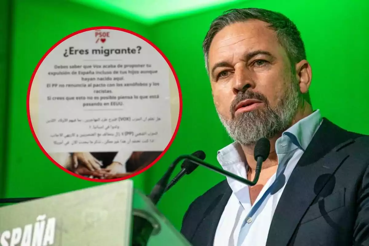 Un hombre de barba y cabello corto habla frente a un micrófono con fondo verde, mientras a la izquierda aparece un cartel enmarcado en rojo con el texto "¿Eres migrante?" y un mensaje sobre propuestas políticas relacionadas con la migración en España.