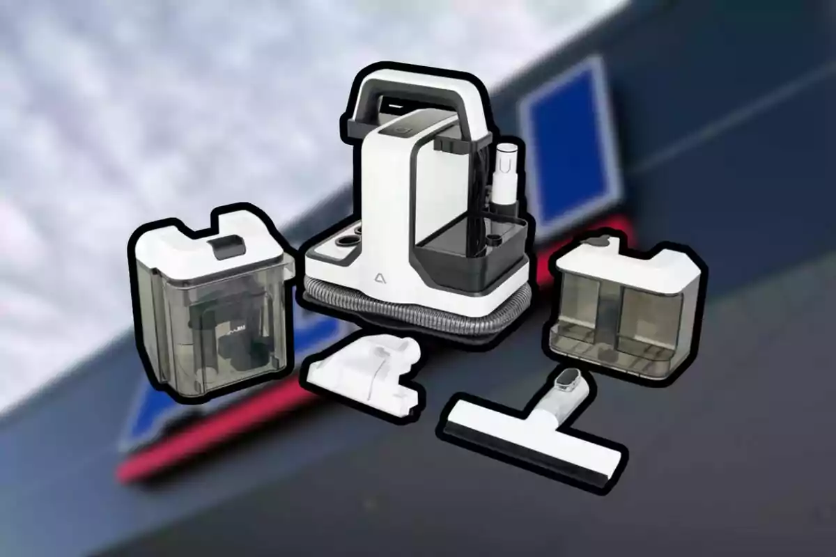 Aspiradora portàtil blanca amb diversos accessoris i dipòsits intercanviables sobre un fons desenfocat.