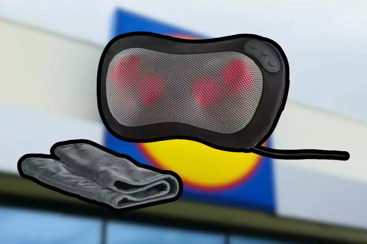 Electric massage cushion with gray cover against a blurred store background Electric massage cushion with gray cover against a blurred store background