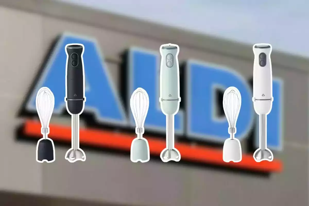 Three hand mixers with accessories in different colors in front of a blurry Aldi store sign Three hand mixers with accessories in different colors in front of a blurry Aldi store sign