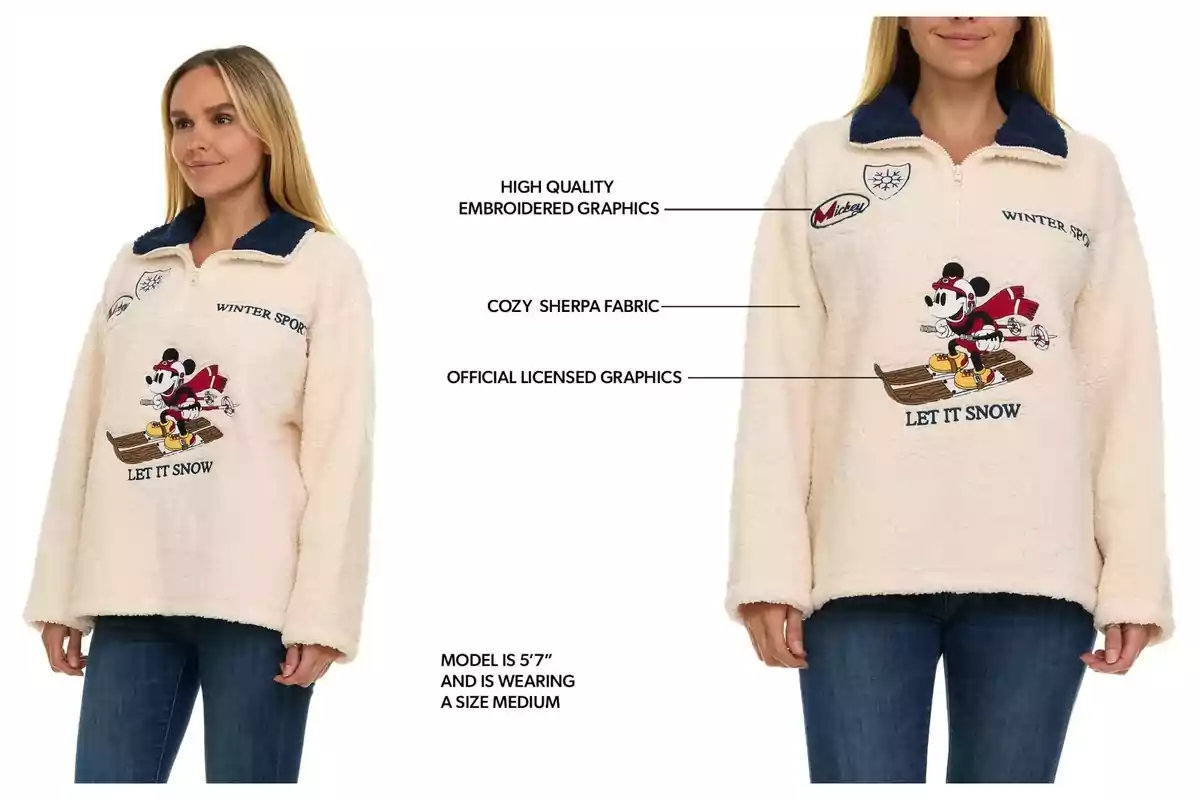 Woman wearing a cream-colored sherpa fabric sweater with embroidered graphics of Mickey Mouse skiing and the phrases Woman wearing a cream-colored sherpa fabric sweater with embroidered graphics of Mickey Mouse skiing and the phrases