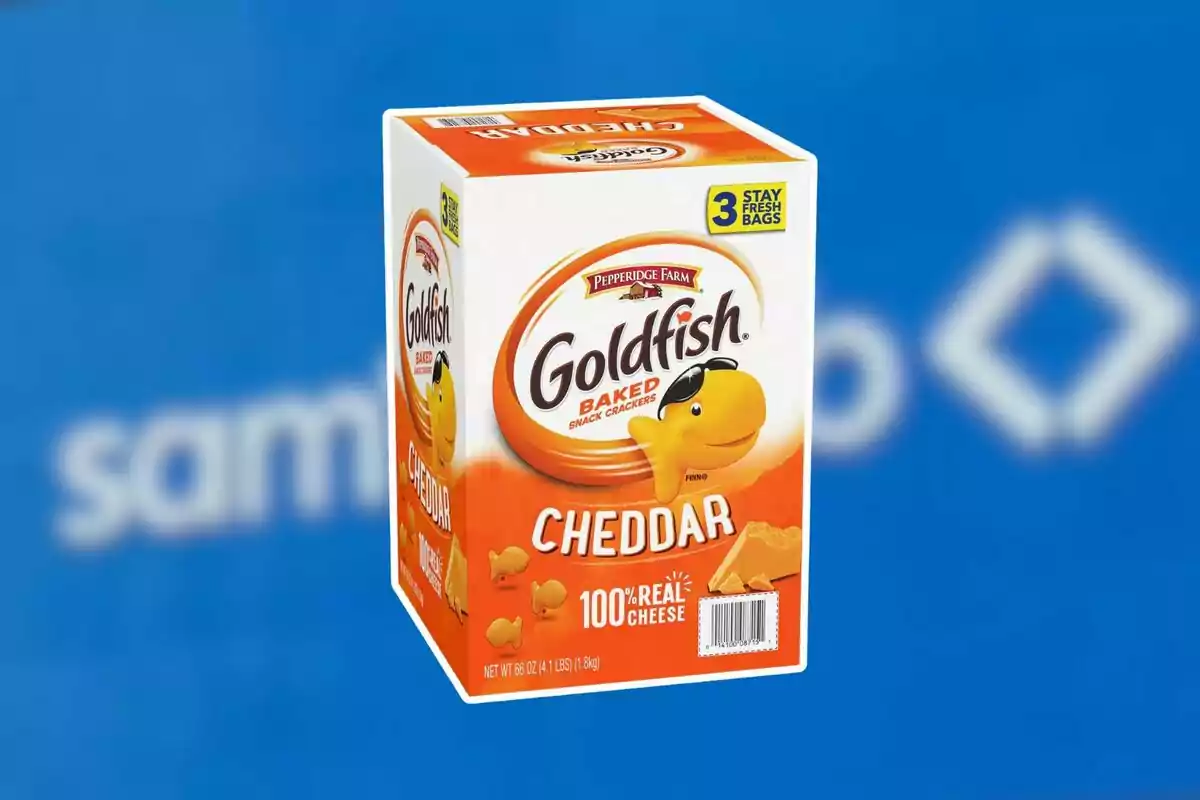 Large box of cheddar Goldfish crackers on a blurred blue background Large box of cheddar Goldfish crackers on a blurred blue background
