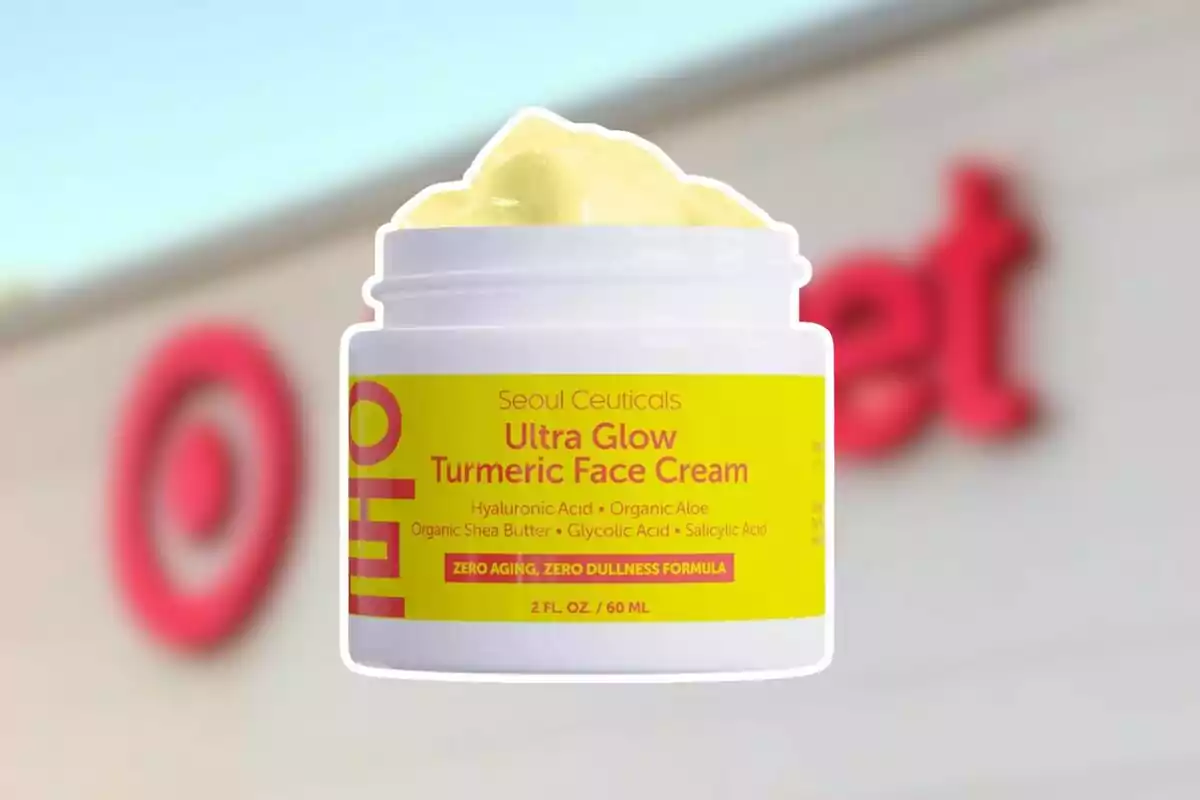 Envase de crema facial Ultra Glow Turmeric de Seoul Ceuticals con fondo desenfocado de una tienda Target