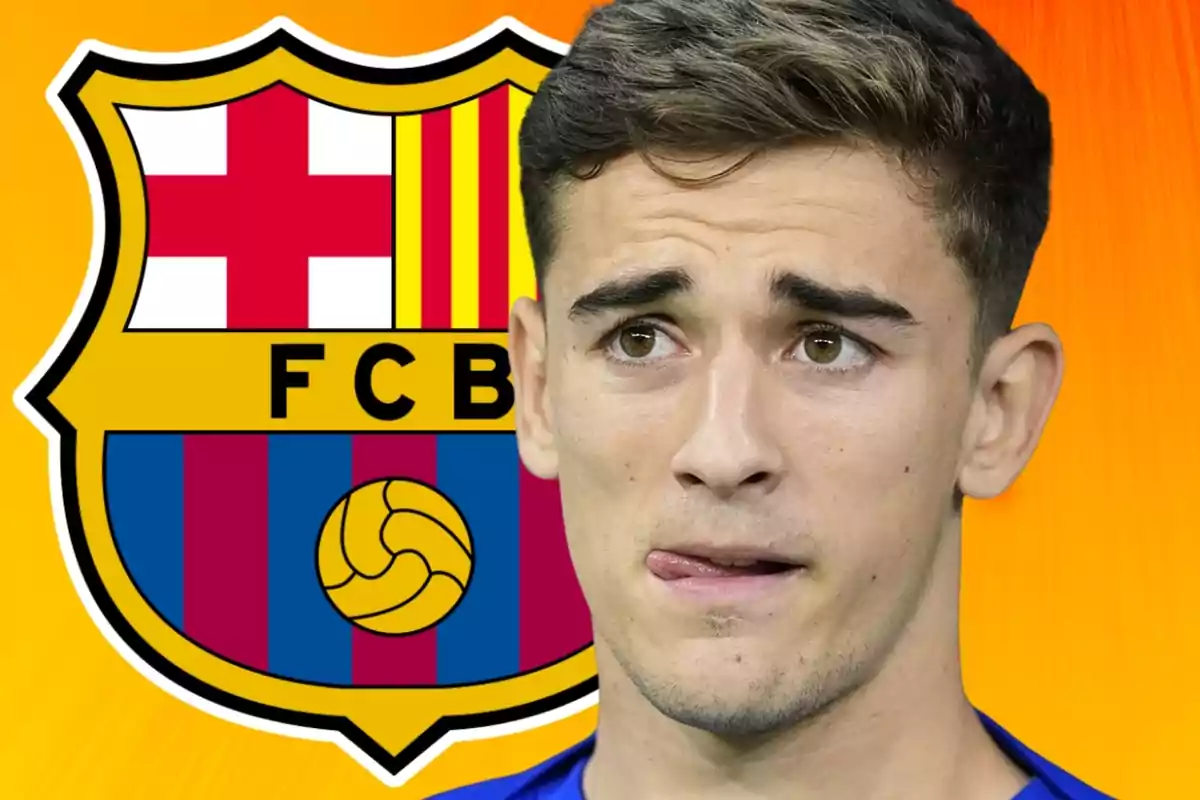 Young man in a blue t-jersey in front of the FC Barcelona crest against an orange background