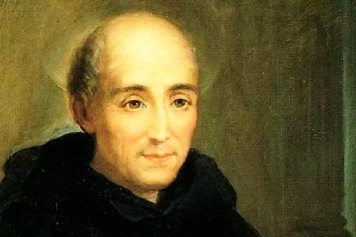 Retrato de un hombre calvo con túnica oscura y expresión serena sobre un fondo neutro. Retrato de un hombre calvo con túnica oscura y expresión serena sobre un fondo neutro.