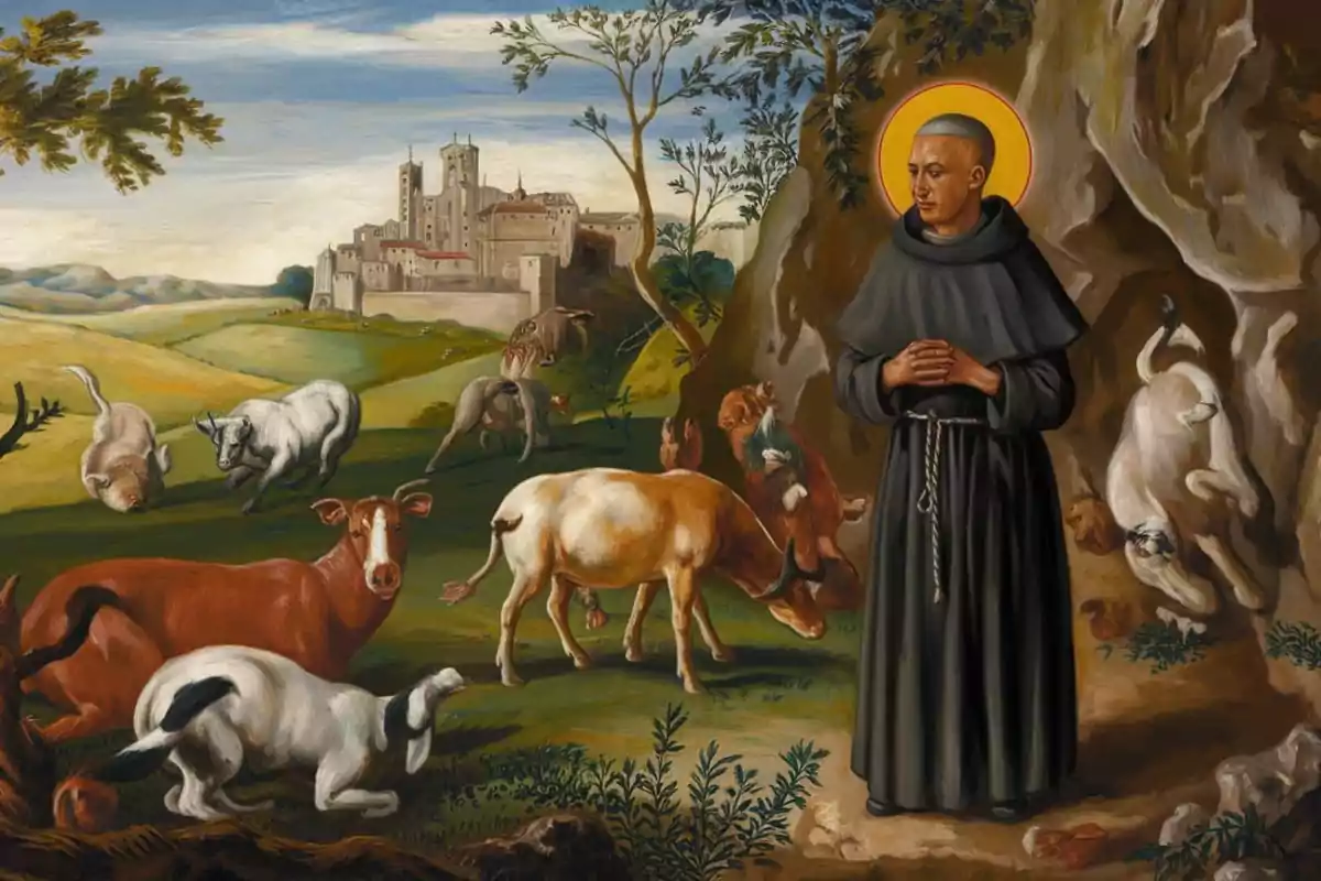 Un monje con halo dorado está de pie junto a una cueva mientras varios animales de granja pastan y descansan en un paisaje campestre con un castillo al fondo