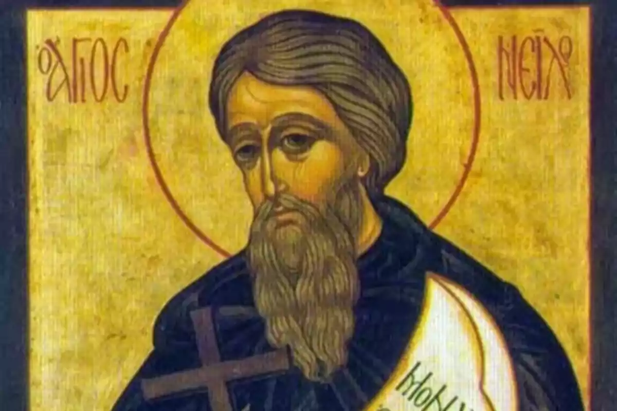 Pintura religiosa de un hombre con barba y halo sosteniendo una cruz y un pergamino sobre fondo dorado Pintura religiosa de un hombre con barba y halo sosteniendo una cruz y un pergamino sobre fondo dorado