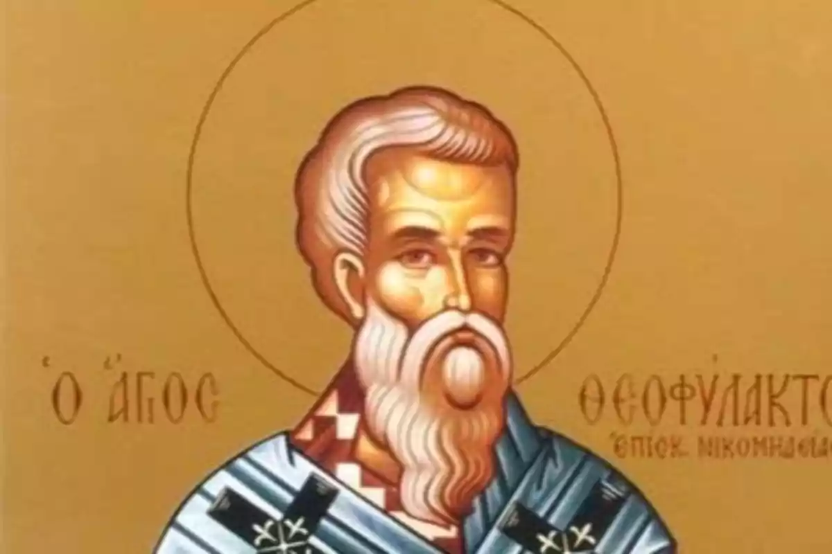 Icona religiosa d’un home amb barba blanca i túnica blava sobre fons daurat amb lletres gregues