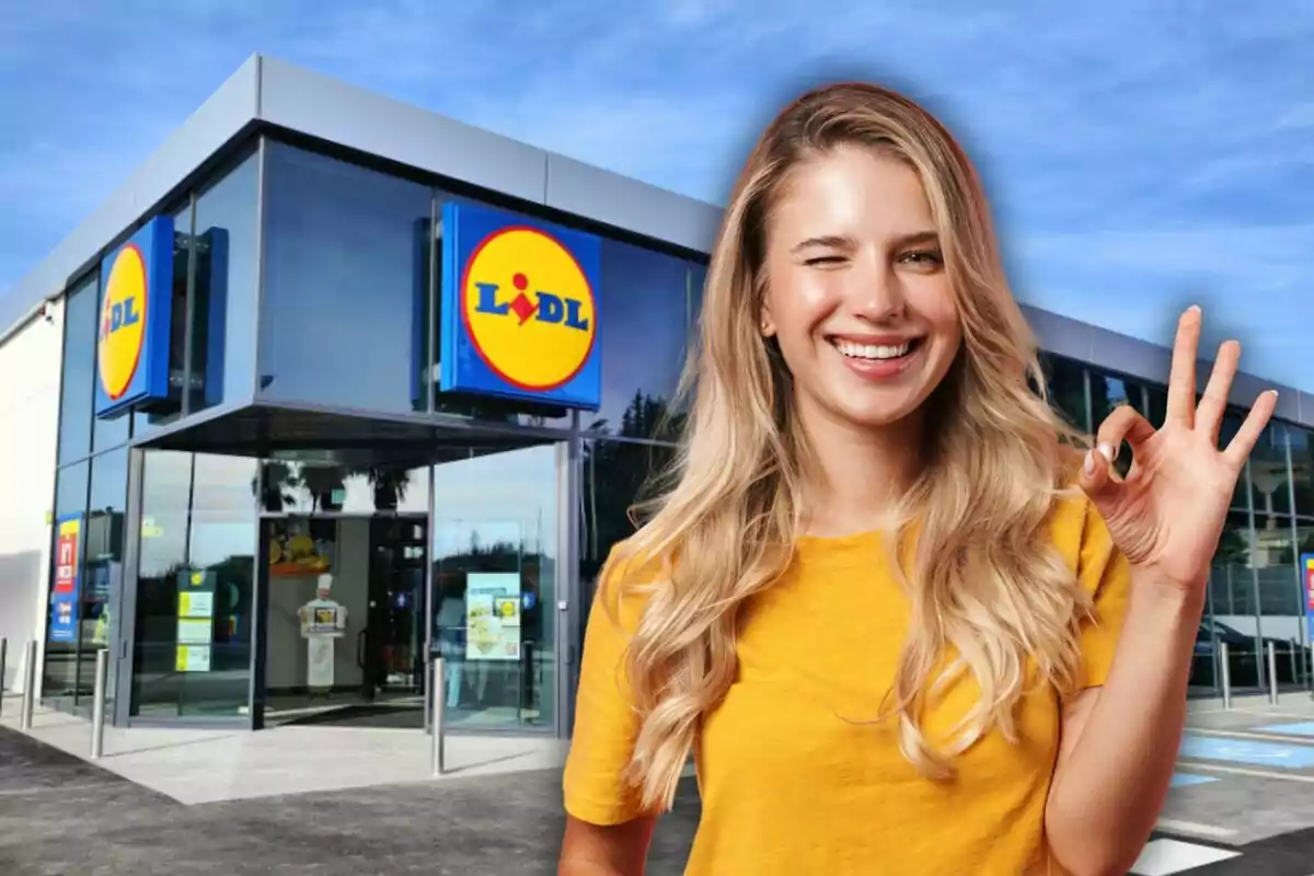 Smiling woman in a yellow t-jersey making the OK gesture in front of a Lidl store