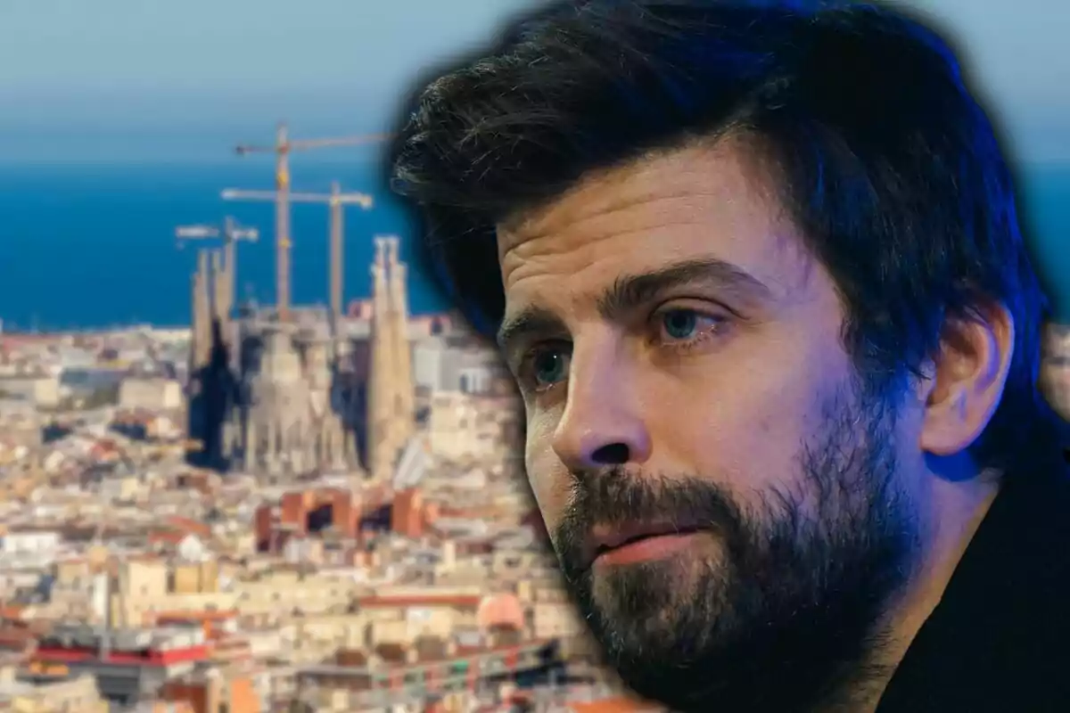 Primer pla d’un home amb barba i cabells foscos sobre un fons de la ciutat de Barcelona on es distingeix la Sagrada Família.