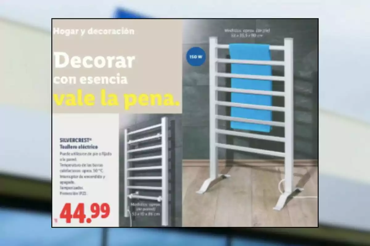 Publicitat d’un tovalloler elèctric blanc amb una tovallola blava penjada, preu de 44,99 euros i text promocional sobre decoració de la llar
