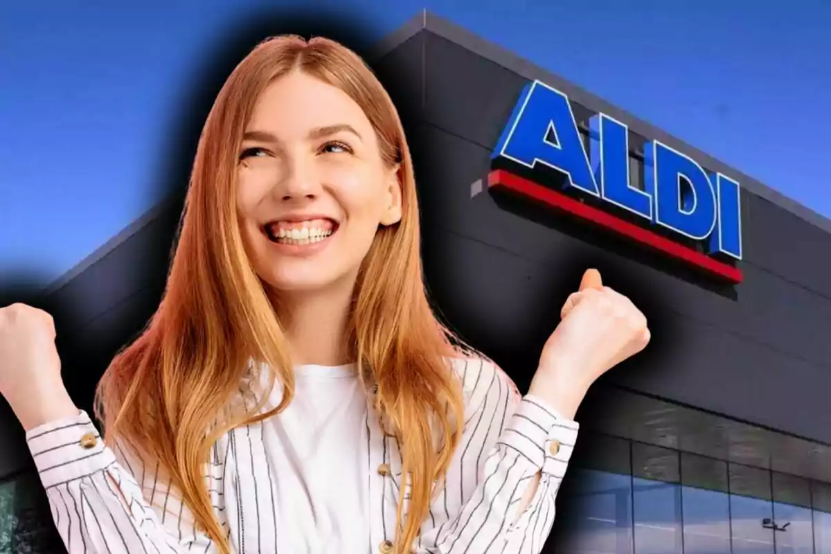 Dona jove somrient amb expressió d’alegria davant d’una botiga ALDI.