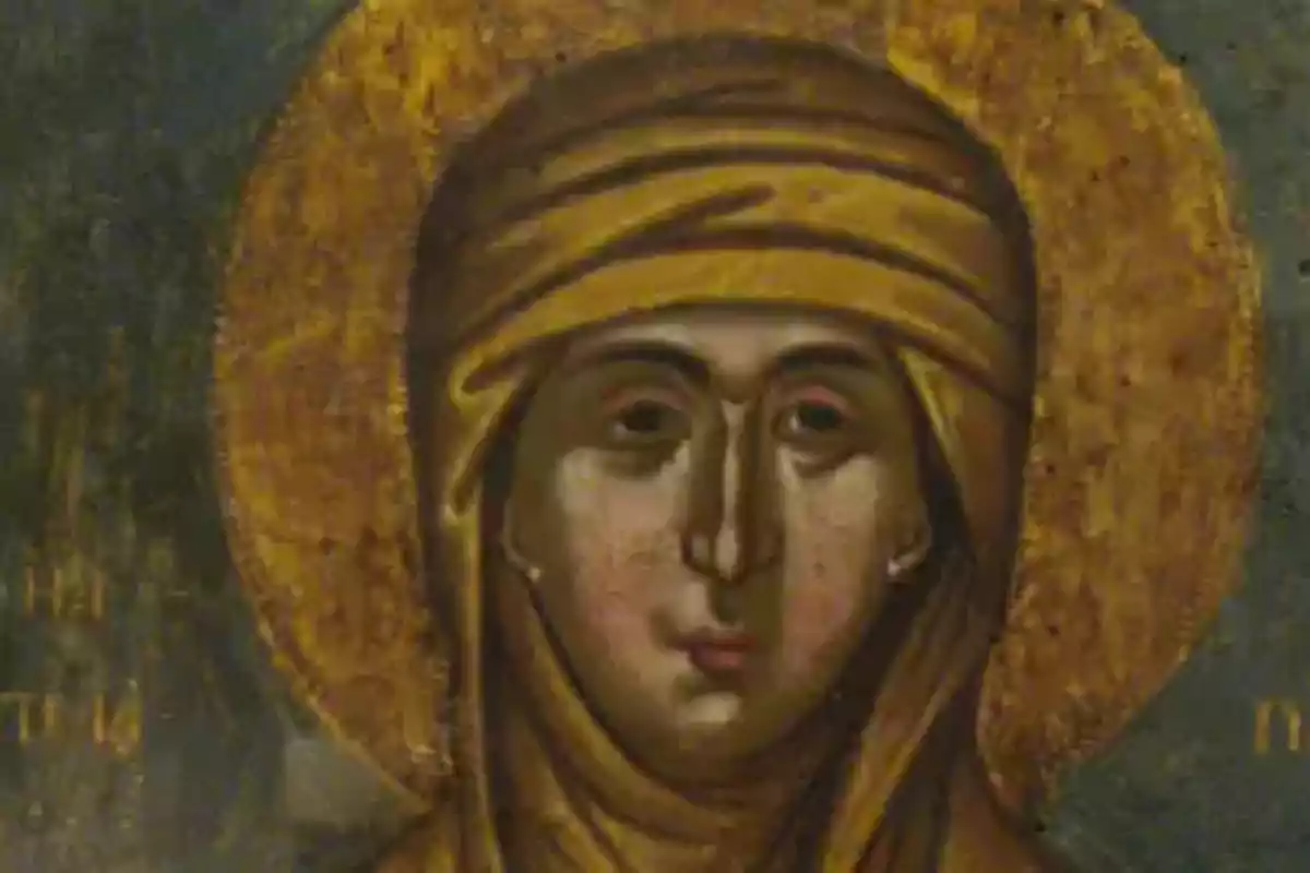Pintura religiosa de una mujer con halo dorado y vestimenta marrón