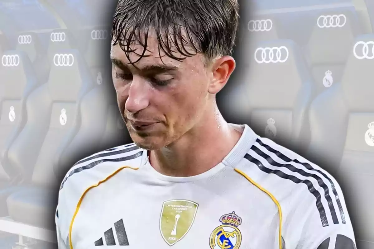Jugador del Real Madrid con expresión de tristeza y fondo de banquillo difuminado