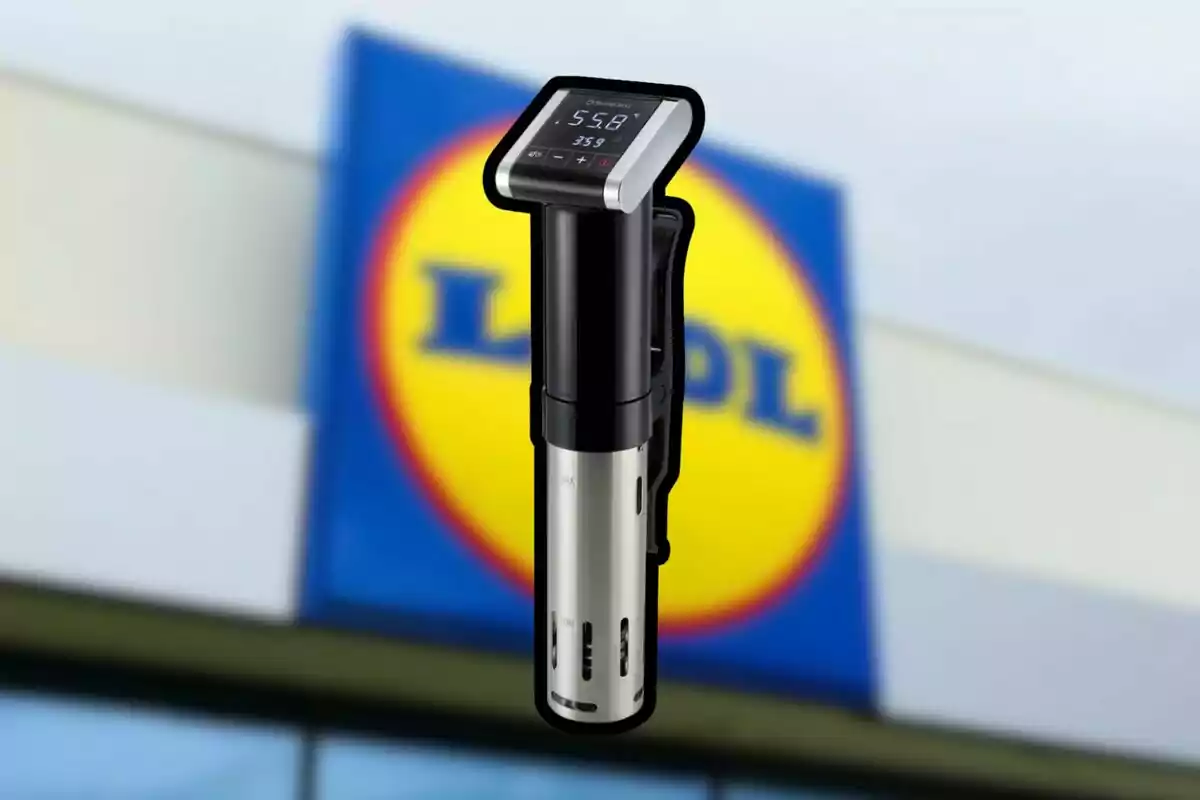 An immersion circulator for sous vide cooking in front of a blurred Lidl store. An immersion circulator for sous vide cooking in front of a blurred Lidl store.