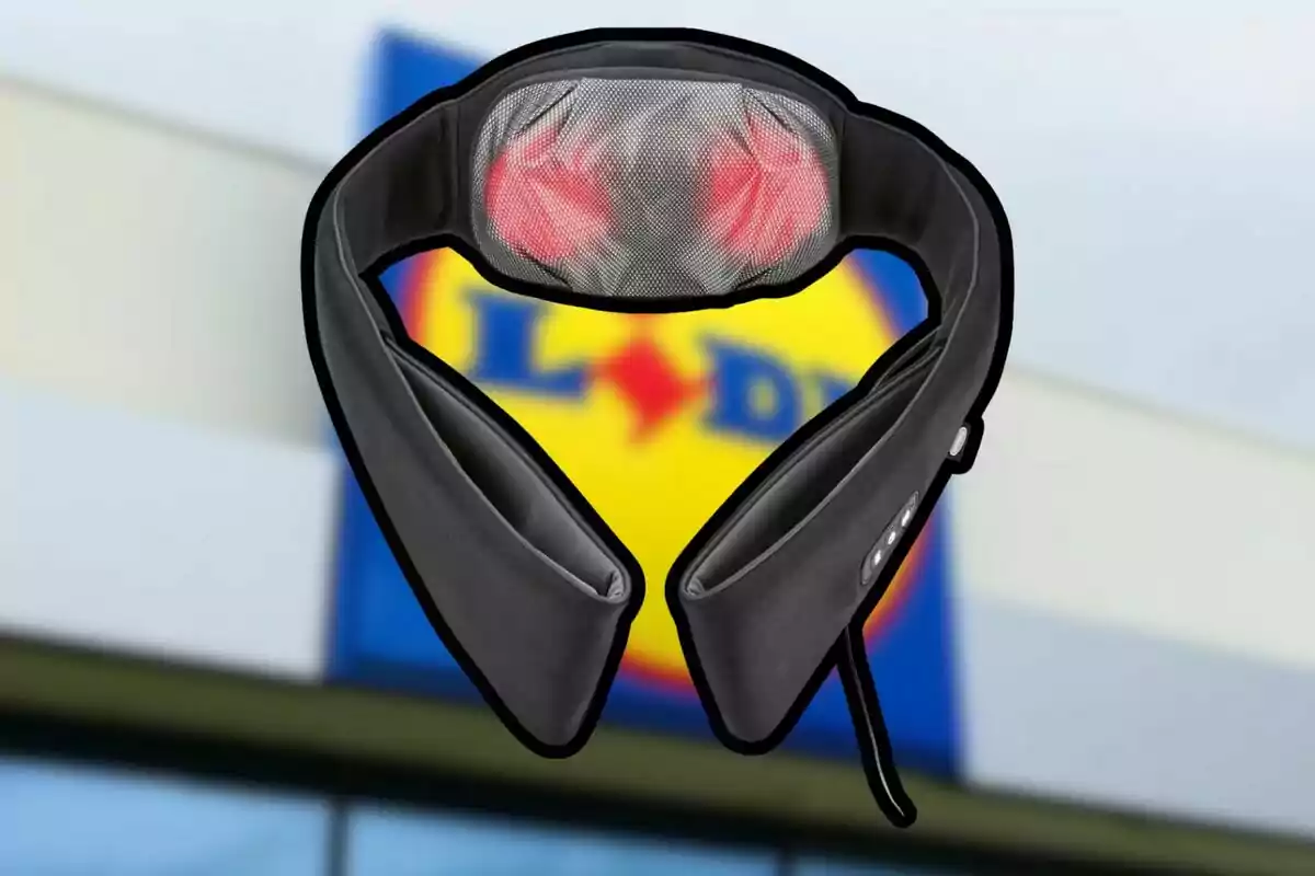 Black electric massager with heat function in front of a blurry Lidl store sign