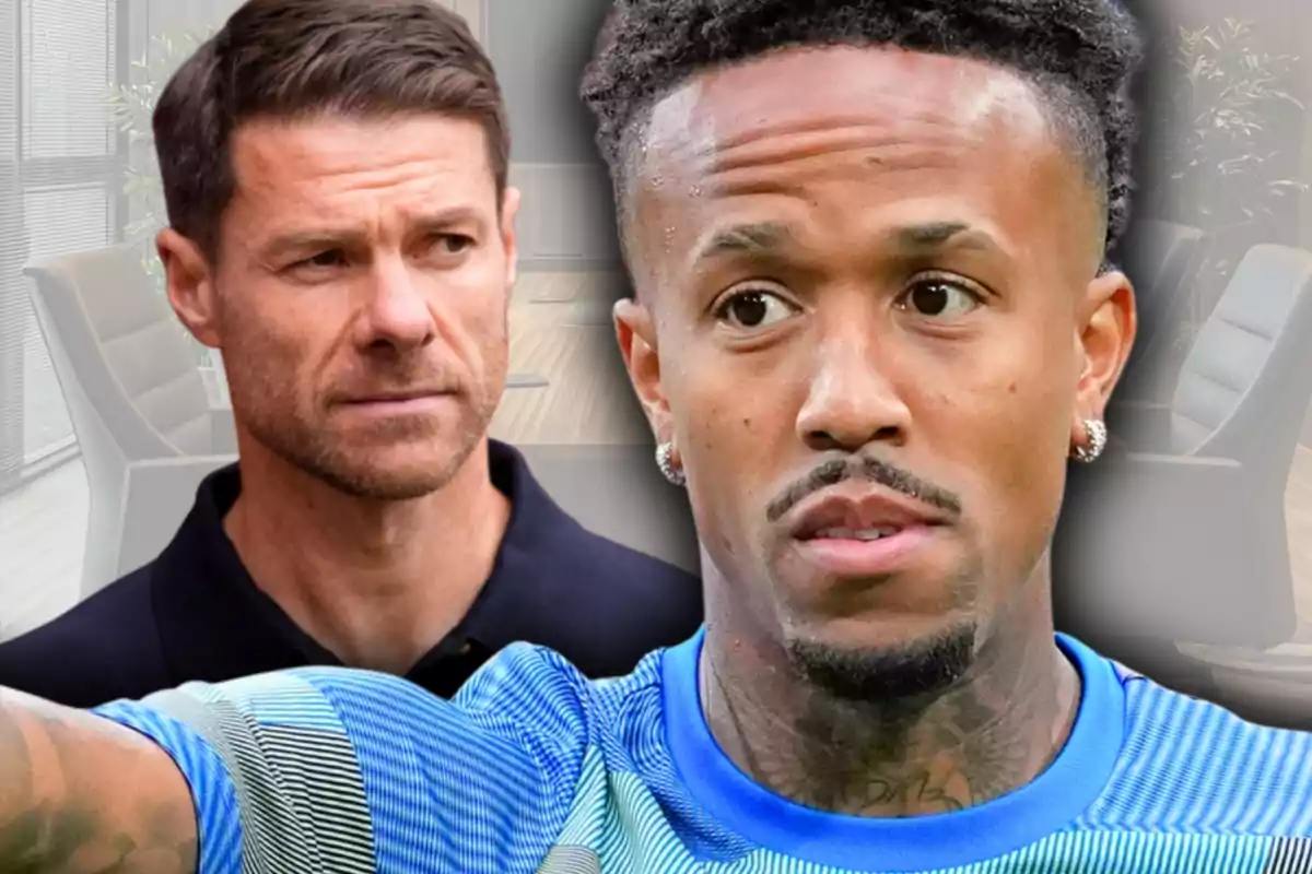 Dos homes en primer pla amb expressió seriosa, un d’ells porta una samarreta esportiva blava i l’altre vesteix una camisa fosca, al fons es veu una oficina desenfocada.