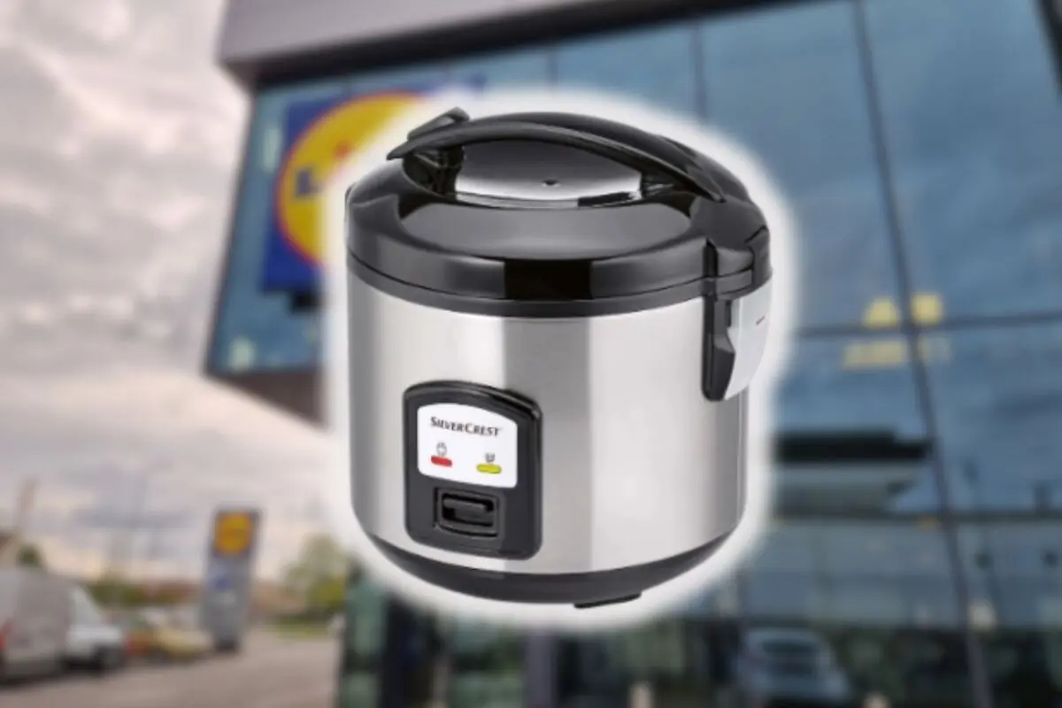 SilverCrest silver electric rice cooker in front of a store with a blurred Lidl logo in the background
